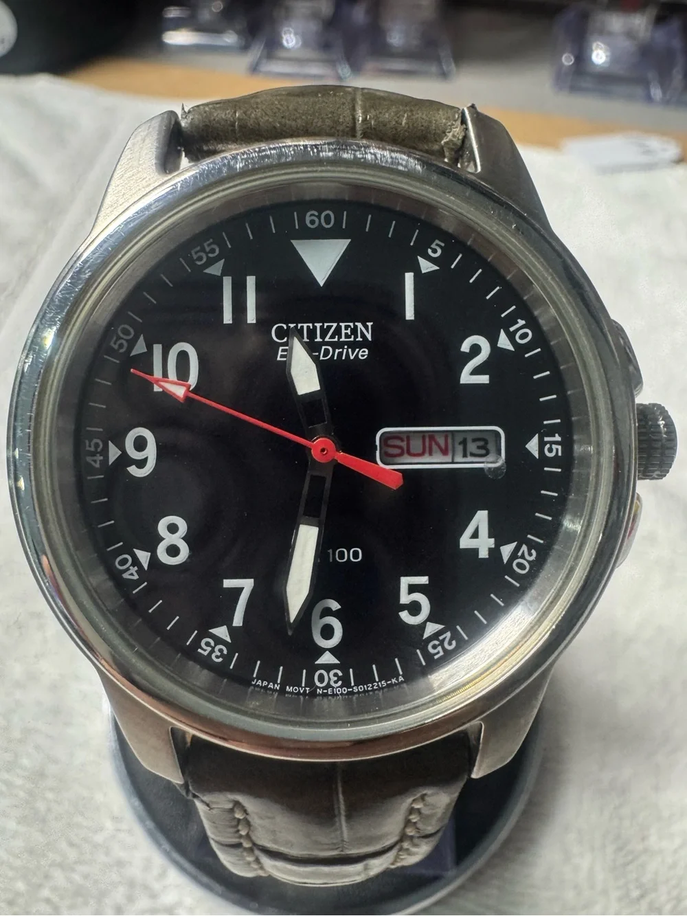 Citizen Men's Black Dial Watch with Red Second Hand and Brown Strap